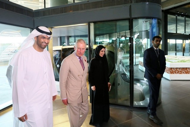VIP transit: Prince Charles enjoys a driverless vehicle at Masdar City